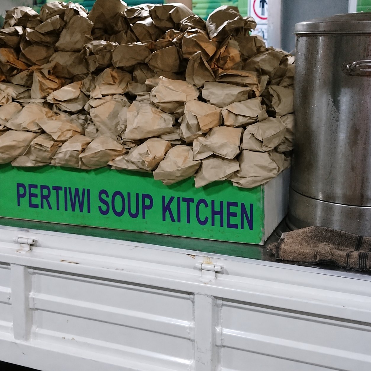 Prepared meal packages at PERTIWI Soup Kitchen during a volunteer activity in Malaysia
